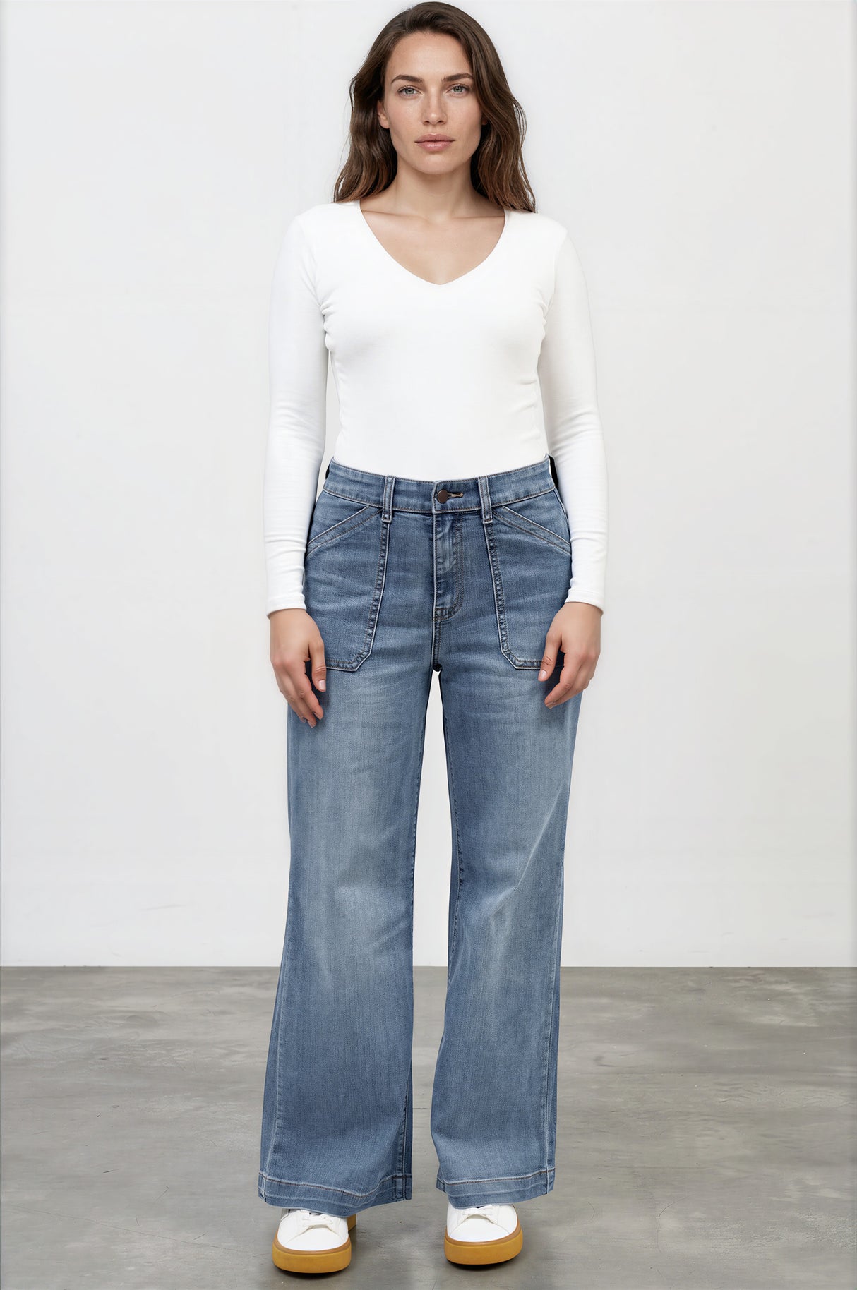 Model wearing Amonie Jeans in Mid Wash Denim from Salty Crush