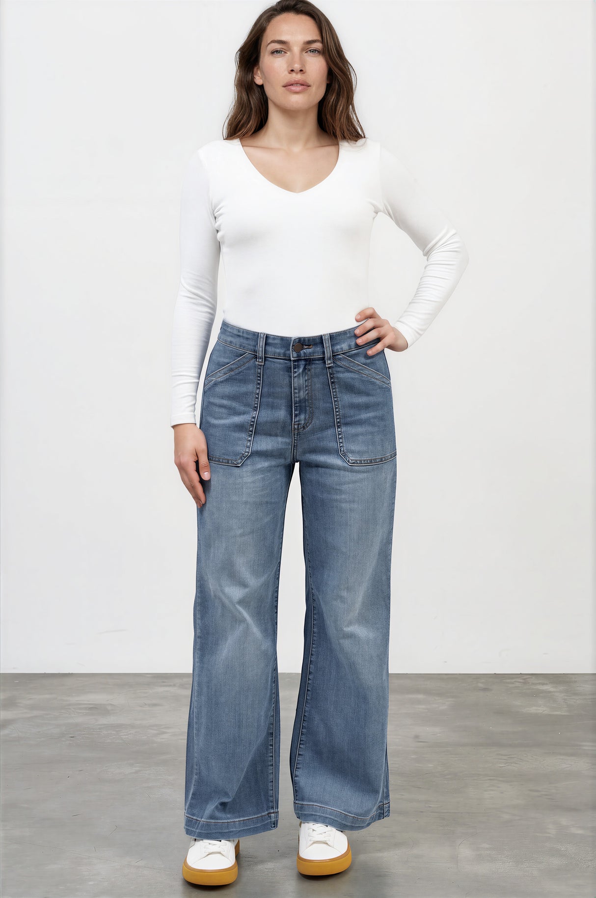 Model wearing Amonie Jeans in Mid Wash Denim from Salty Crush