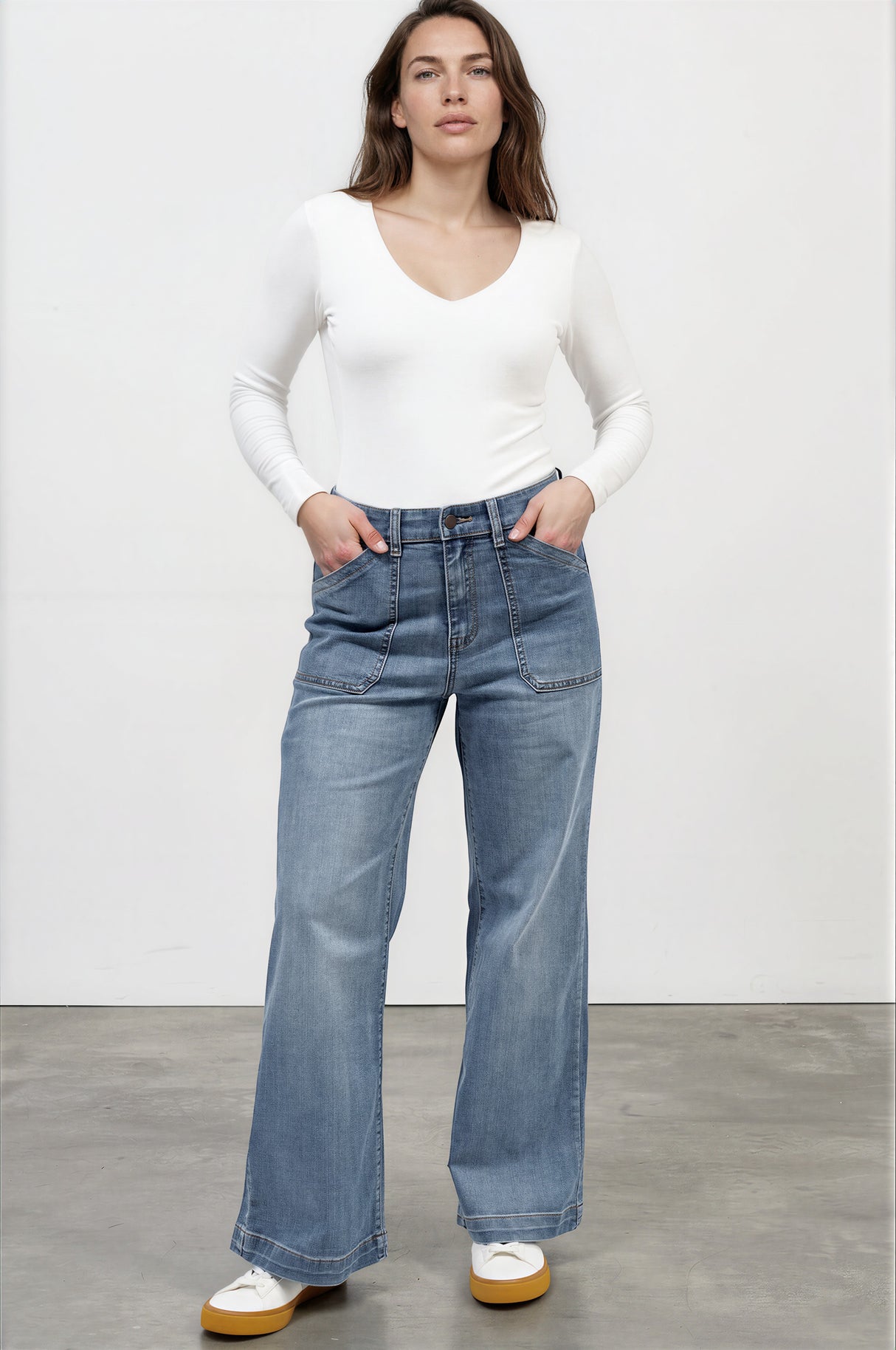 Model wearing Amonie Jeans in Mid Wash Denim from Salty Crush