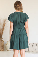 Model wearing Amy Mini Dress in Emerald from Salty Crush