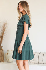 Model wearing Amy Mini Dress in Emerald from Salty Crush