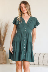 Model wearing Amy Mini Dress in Emerald from Salty Crush