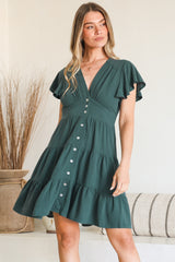 Model wearing Amy Mini Dress in Emerald from Salty Crush