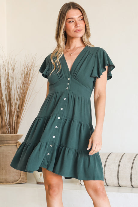 Model wearing Amy Mini Dress in Emerald from Salty Crush