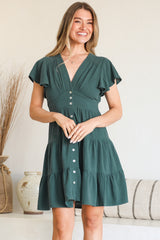 Model wearing Amy Mini Dress in Emerald from Salty Crush