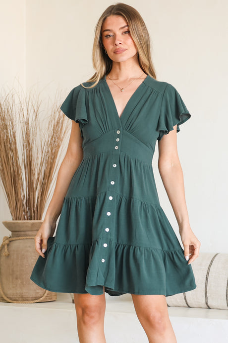 Model wearing Amy Mini Dress in Emerald from Salty Crush