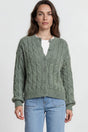 Model wearing Aspen Cardigan in Green from Salty Crush