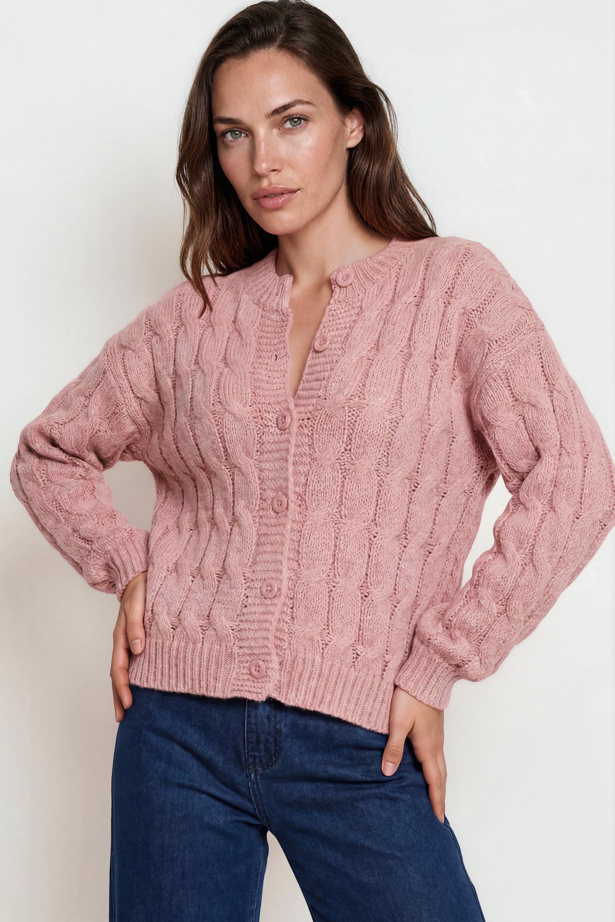 Model wearing Aspen Cardigan in Pink from Salty Crush
