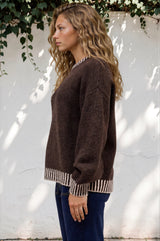 Model wearing Aura Jumper in Chocolate from Salty Crush
