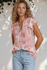 Model wearing Avril Blouse in Alani Print from Salty Crush
