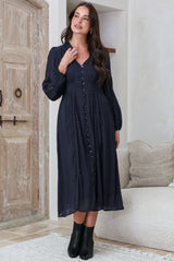 Model wearing Aylon Midi Dress in Navy from Salty Crush