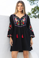 Model wearing Azalea Mini Dress in Black from Salty Crush
