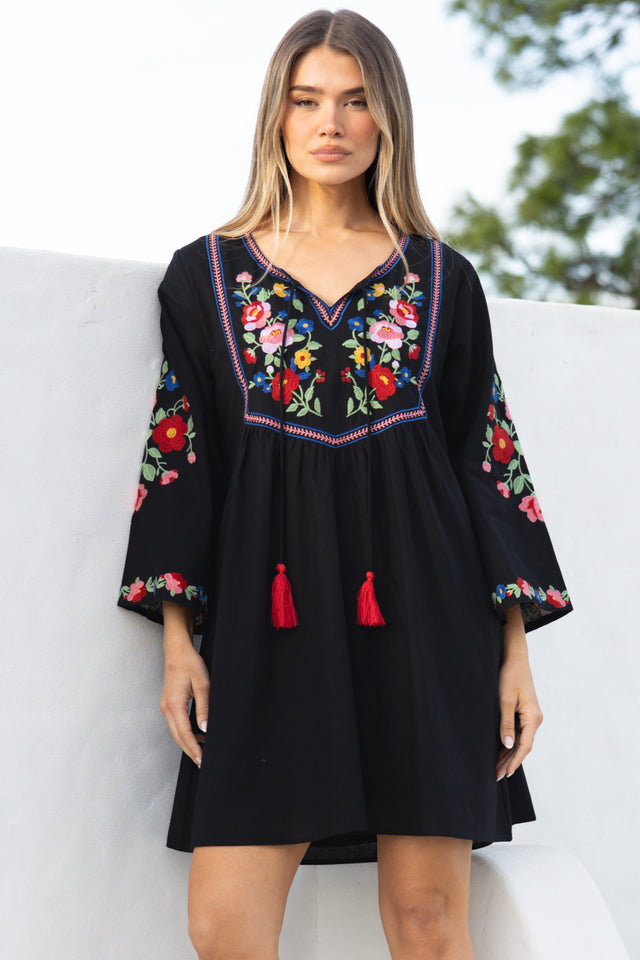 Model wearing Azalea Mini Dress in Black from Salty Crush