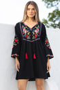 Model wearing Azalea Mini Dress in Black from Salty Crush
