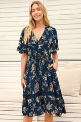 Model wearing Balenca Mini Dress in Salvia Print Navy from Salty Crush