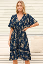 Model wearing Balenca Mini Dress in Salvia Print Navy from Salty Crush