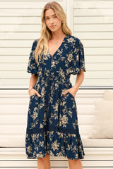 Model wearing Balenca Mini Dress in Salvia Print Navy from Salty Crush