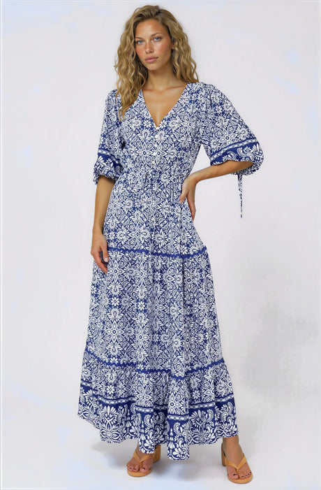 A woman Baxter Maxi Dress in Harley Print Blue from Salty Crush