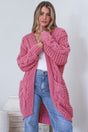 Model wearing Beckett Cardigan in Pink from Salty Crush