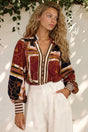 Model wearing Beldon Blouse in Celia Print from Salty Crush