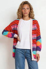 Model wearing Bellatrix Cardigan in Pink from Salty Crush