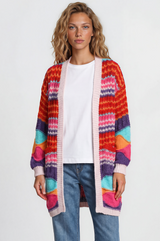 Model wearing Bellatrix Cardigan in Pink from Salty Crush