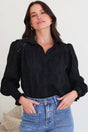 Model wearing Benton Blouse in Black from Salty Crush