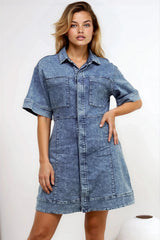 Model wearing Bigsby Denim Mini Dress in Mid Wash Denim from Salty Crush