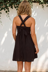 Model wearing Bliss Mini Dress in Black from Salty Crush