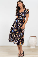 Blissful Midi Dress - A-Line Dress with Shirred Bodice and Short Sleeves in Talita Print Black