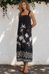 Model wearing Bodie Midi Dress in Aviv Print Black from Salty Crush