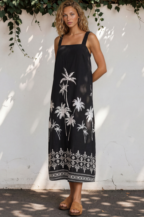 Model wearing Bodie Midi Dress in Aviv Print Black from Salty Crush
