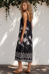 Model wearing Bodie Midi Dress in Aviv Print Black from Salty Crush