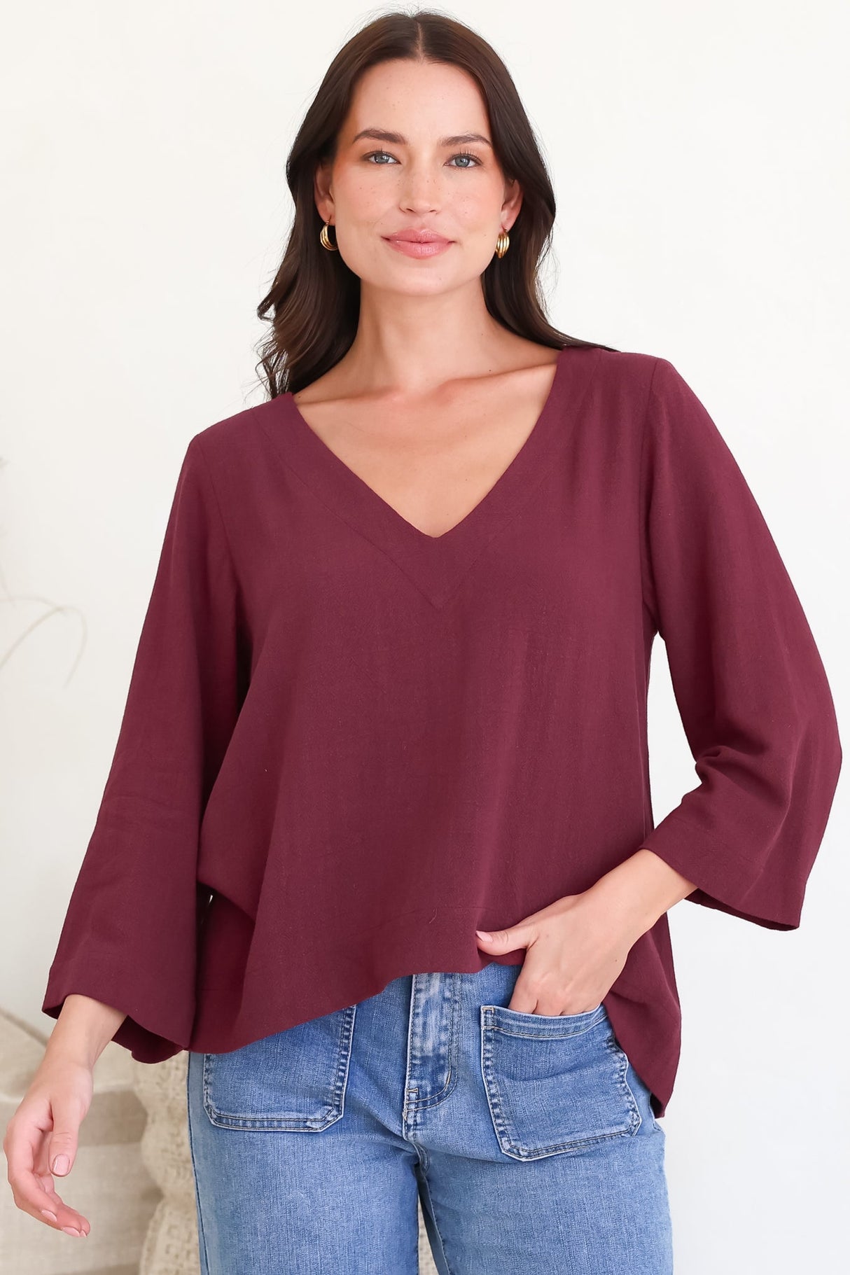 Model wearing Breezer Top in Wine from Salty Crush