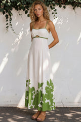 Model wearing Bria Maxi Dress in Clover Print from Salty Crush