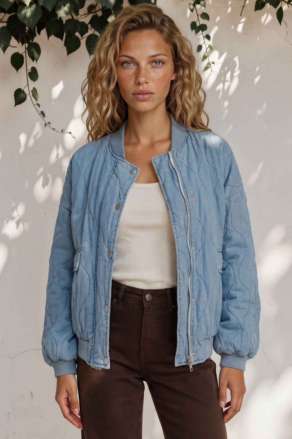 Model wearing Brixton Jacket in Light Denim from Salty Crush