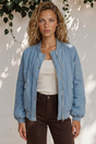 Model wearing Brixton Jacket in Light Denim from Salty Crush