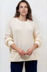 Model wearing Caesar Jumper in Beige from Salty Crush