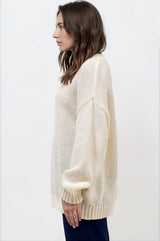 Model wearing Caesar Jumper in Beige from Salty Crush
