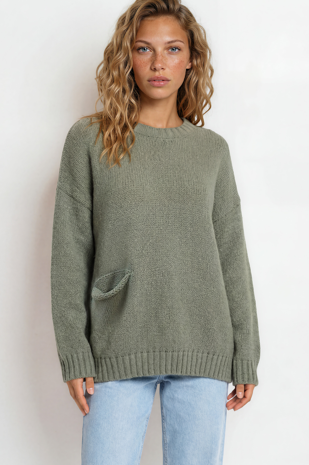 Model wearing Caesar Jumper in Green from Salty Crush