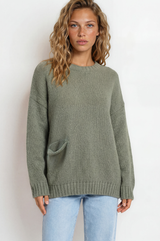 Model wearing Caesar Jumper in Green from Salty Crush