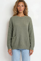 Model wearing Caesar Jumper in Green from Salty Crush