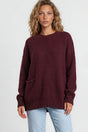 Model wearing Caesar Jumper in Wine from Salty Crush