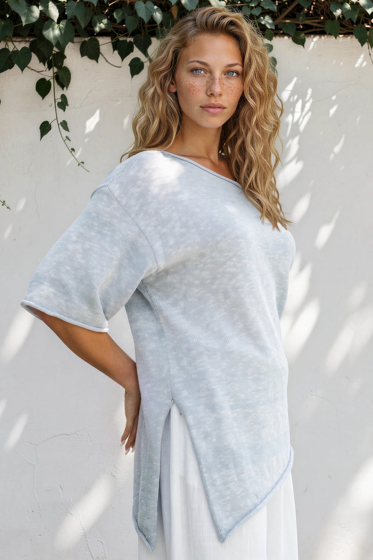 Model wearing Callie Knit Top in Blue from Salty Crush