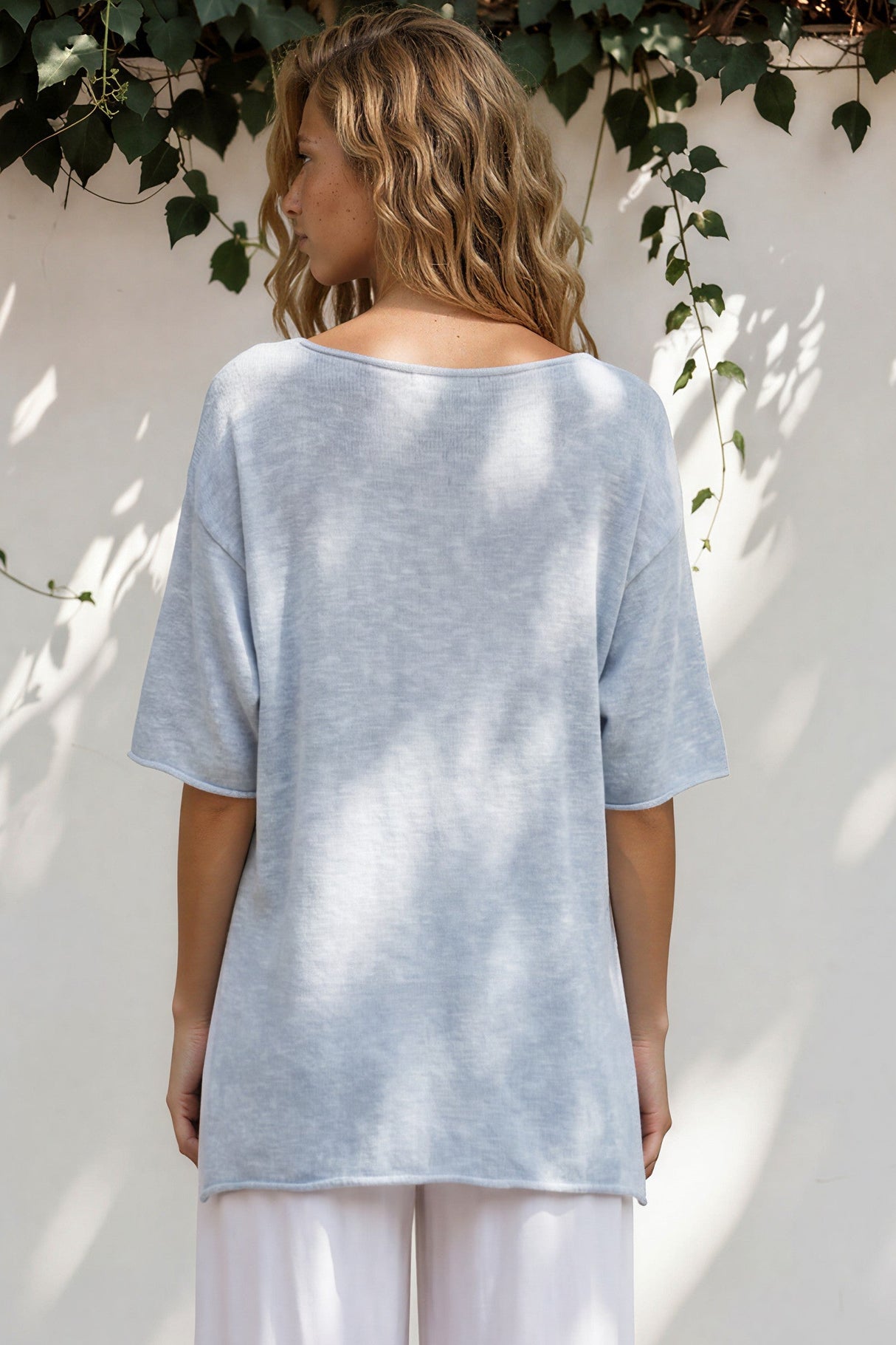 Model wearing Callie Knit Top in Blue from Salty Crush