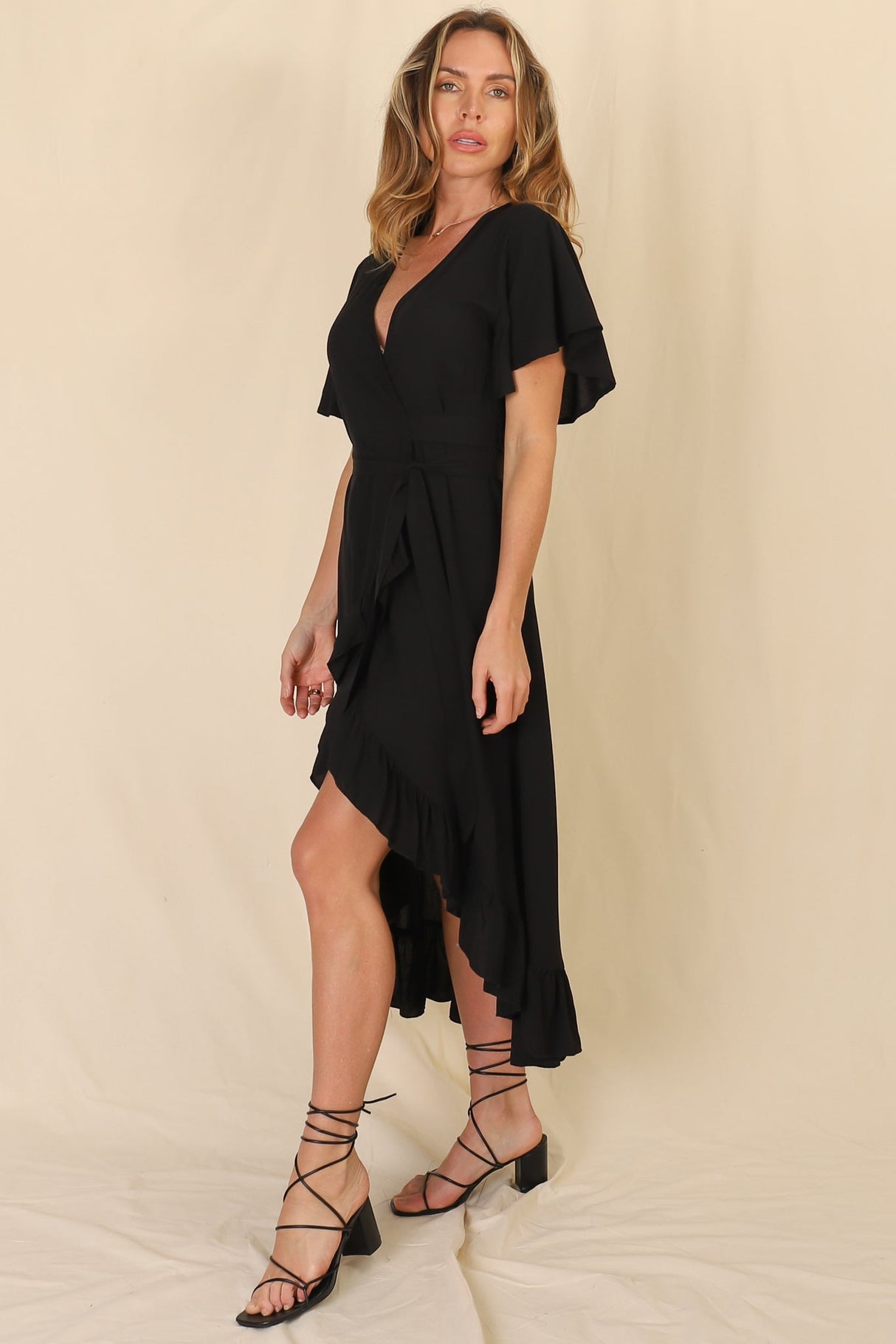 Carolina Midi Dress - V Neck Wrap Dress with Ruffle High Low Hemline in Black