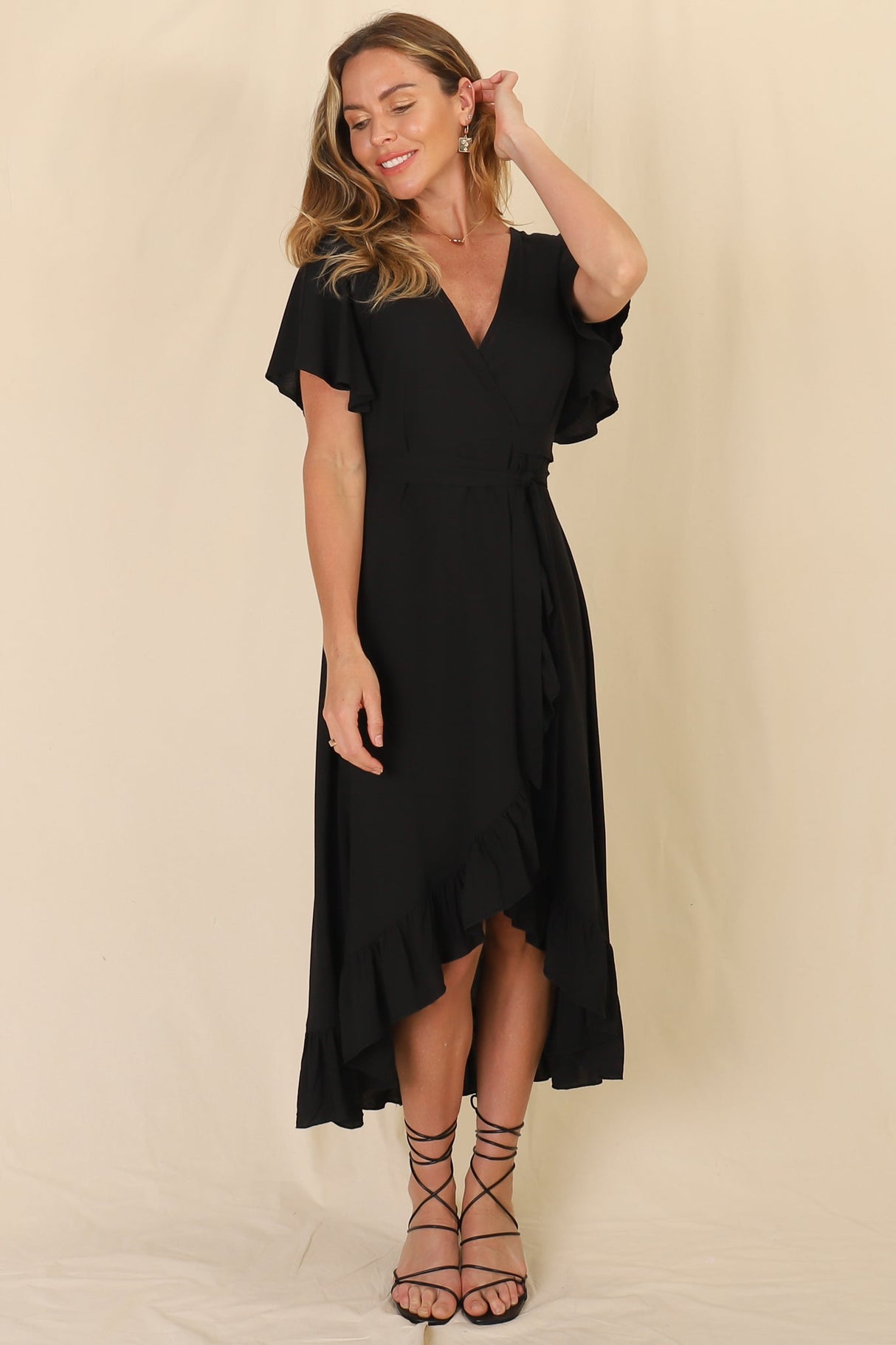 Carolina Midi Dress - V Neck Wrap Dress with Ruffle High Low Hemline in Black