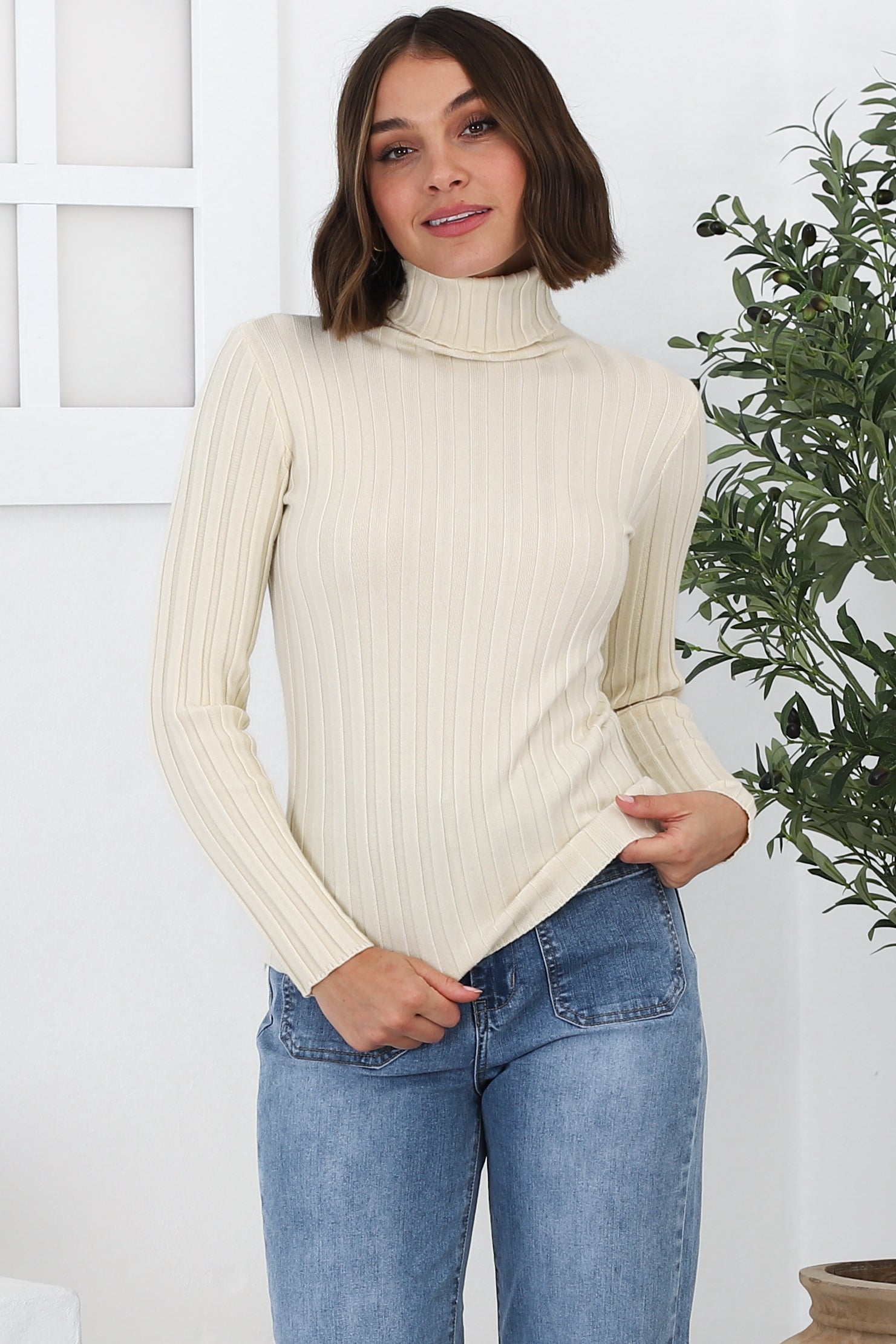 Carson Knit Top - Turtle Neck Knit Top with Scallop Hemlines in Beige