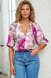 Model wearing Cecilia Blouse in Tiana Print Pink from Salty Crush