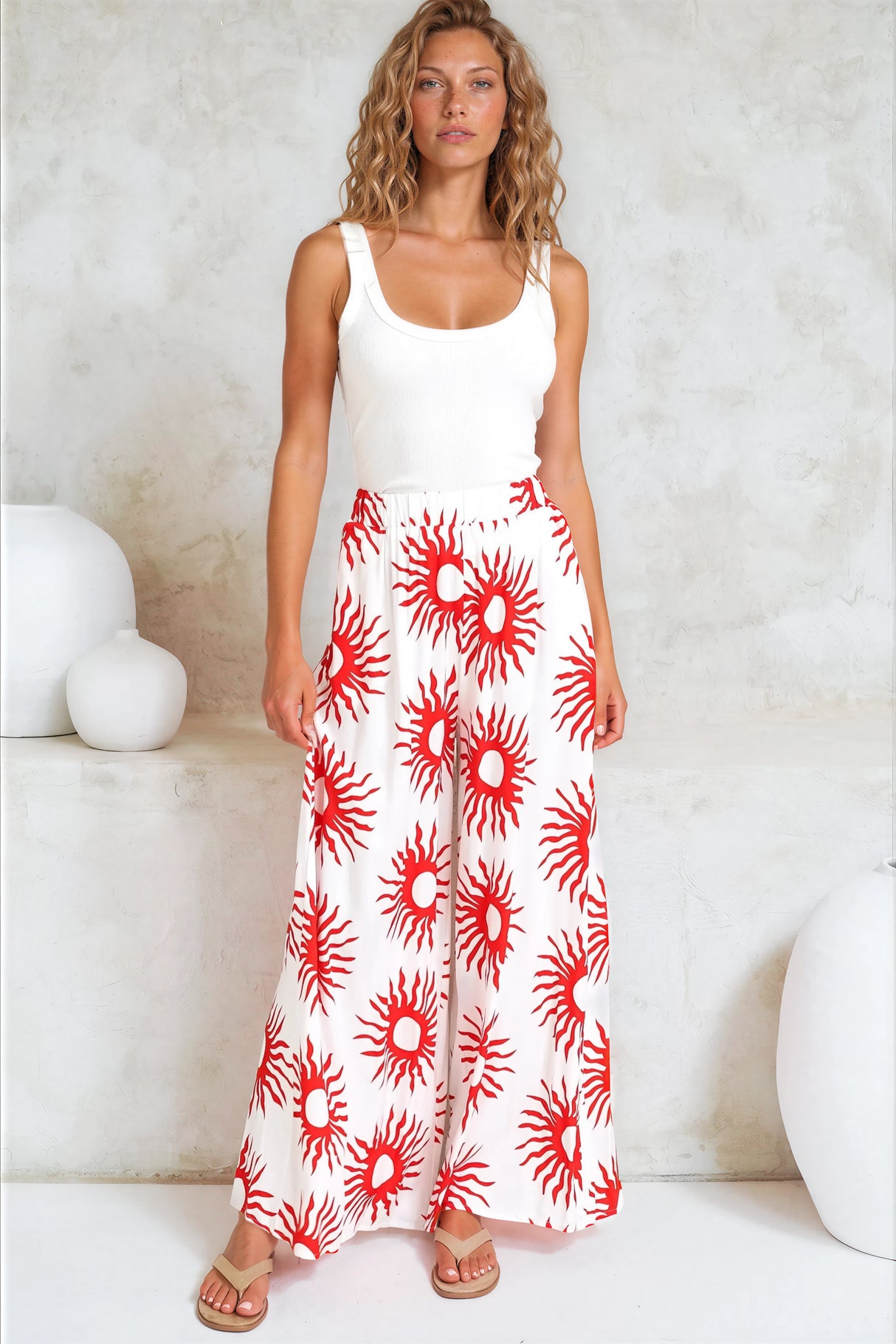 Model wearing Channing Pants in Solar Print Red from Salty Crush